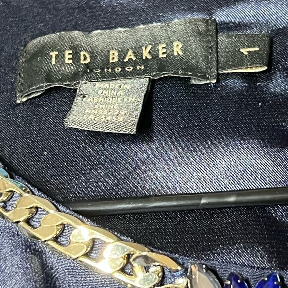 Ted
Baker Kimmiye Navy Blue Pleated Shift Dress embellished neckline Womens Sz 1 - Picture 8 of 10